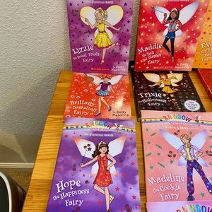 SOLD 11 Scholastic Rainbow Magic Series books.